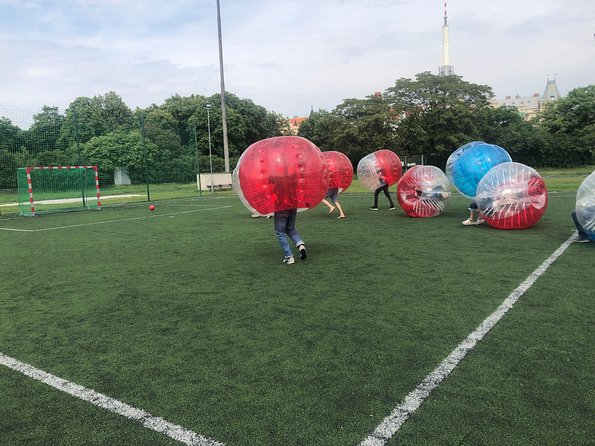 Bubble football - Getting changed, putting on knee protection, and stepping onto the pitch