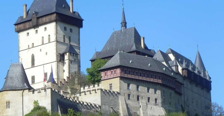 Countryside Bike Tour From Prague To Karlstejn Castle - Early ride segments: Prague streets, river views, and big bridges