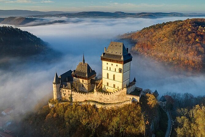 From Prague: Small-Group Karlstejn Castle & Koneprusy Caves Trip - Karlštejn Castle: A Gothic Fortress Built to Guard the Crown Jewels