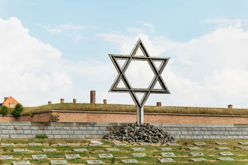 From Prague: Terezin Concentration Camp Guided Tour w/ Audio - Meeting With the Blue-and-White Umbrella: Prague Start and Phone Audio