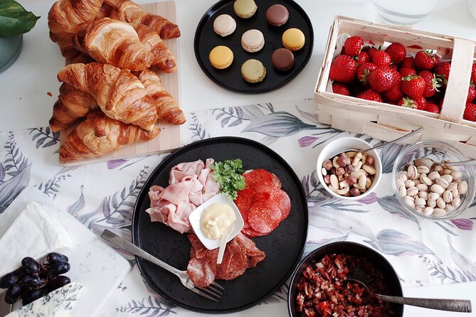 Gourmet Brunch with Chef: Unlimited Drinks & Stunning River Views - The food lineup: grazing table, caviar baked eggs, citrus salmon, and fruit + greens