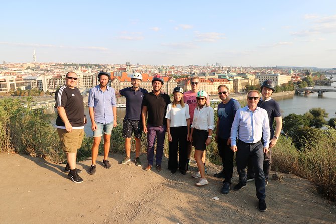 Grand City Tour of Prague on Cruiser e-Bikes or e-Scooters - Kampa Island, Lennon Wall, and Charles Bridge: River-Side Prague