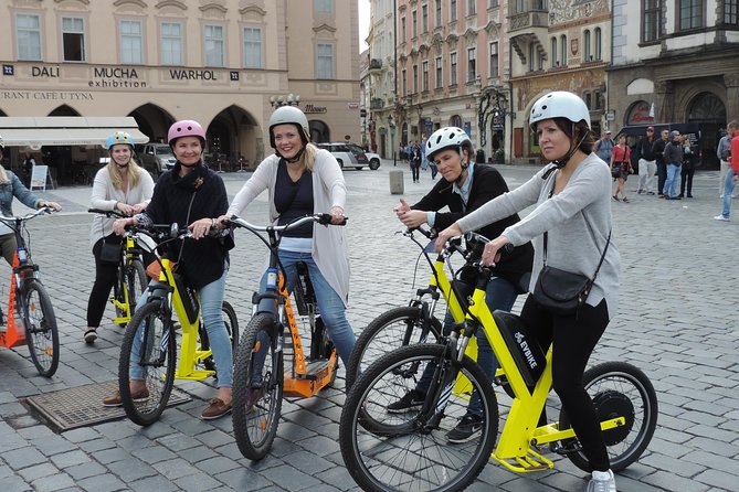 Grand City Tour of Prague on Cruiser e-Bikes or e-Scooters - Kafka to Old Town Square: Clocks, Synagogues, and the Streets Between