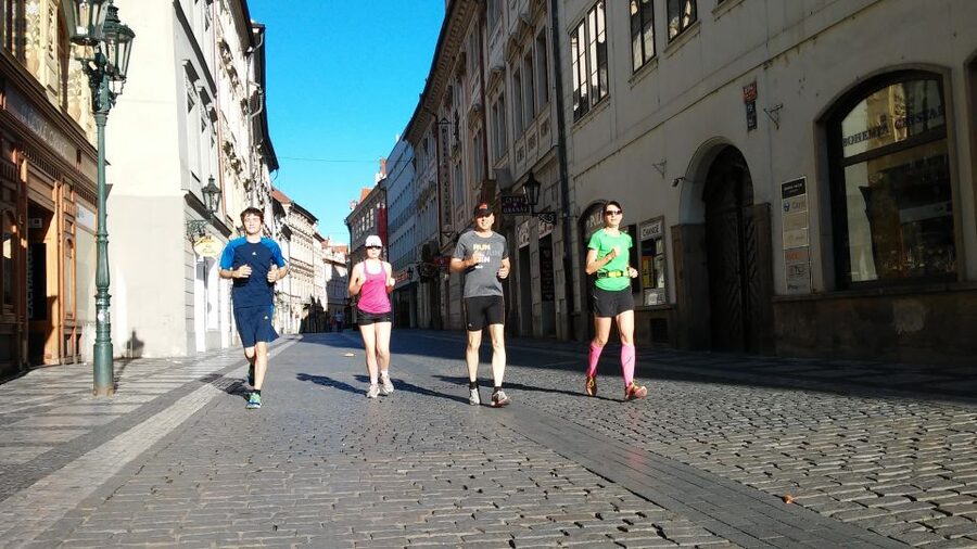 Prague 1.5-Hour Compact City Center Running Tour - How the guide keeps it running: pace control and optional action photos