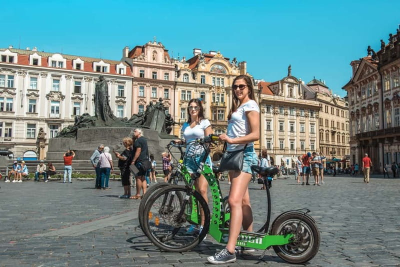 Prague: 4 Hours Grand City Tour by Segway & E-Scooter - Getting set up: helmet, gloves, raincoat, and a guide who keeps you steady