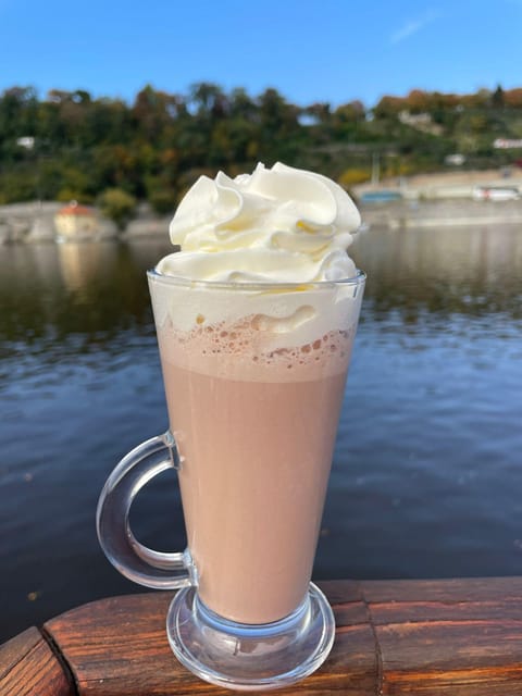 Prague: Advent Boat Cruise with Sweets and Hot Drinks - Seeing Prague’s Advent decorations from the water