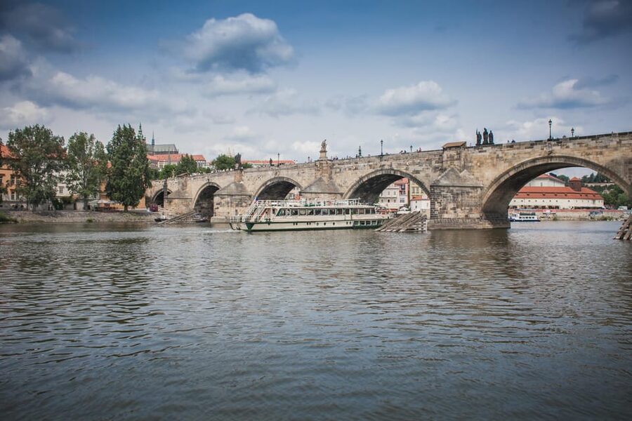 Prague: An unforgettable 2-hour cruise on the Vltava River. - Prague Castle looming above the river