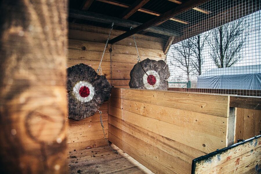 Prague: Axe Throwing Experience with Barbecue and Beer - Throwing at two targets: axes, knives, and ninja stars