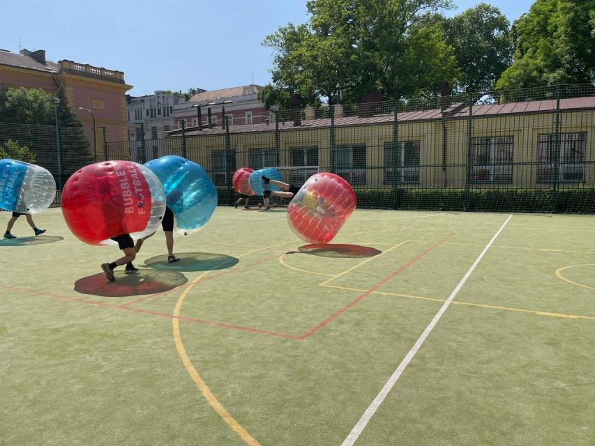 Prague: Bubbles football in city centre of Prague - Knee pads, starting positions, and the first wave of bubble football