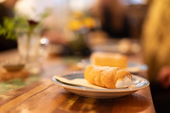 Prague by Night: Drinks & Food Tour with Eating Europe - Stop 3: Seminář Café by Charles Bridge for garlic, bread, and a cold drink