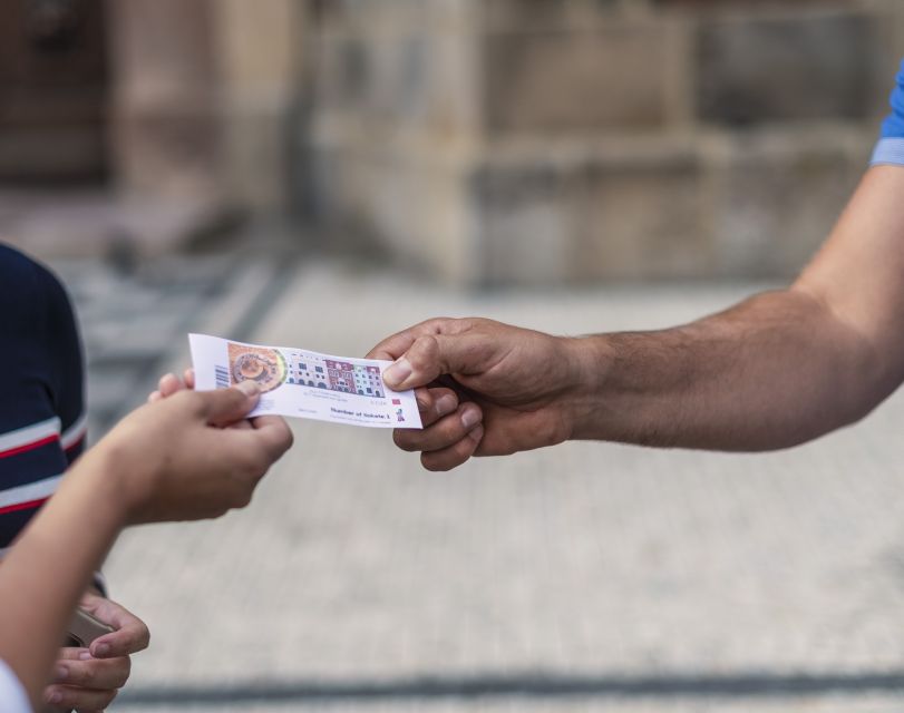 Prague: Charles Bridge Audio Guide with Tower Entry Ticket - Practical tips: phone access, earphones, and keeping it smooth