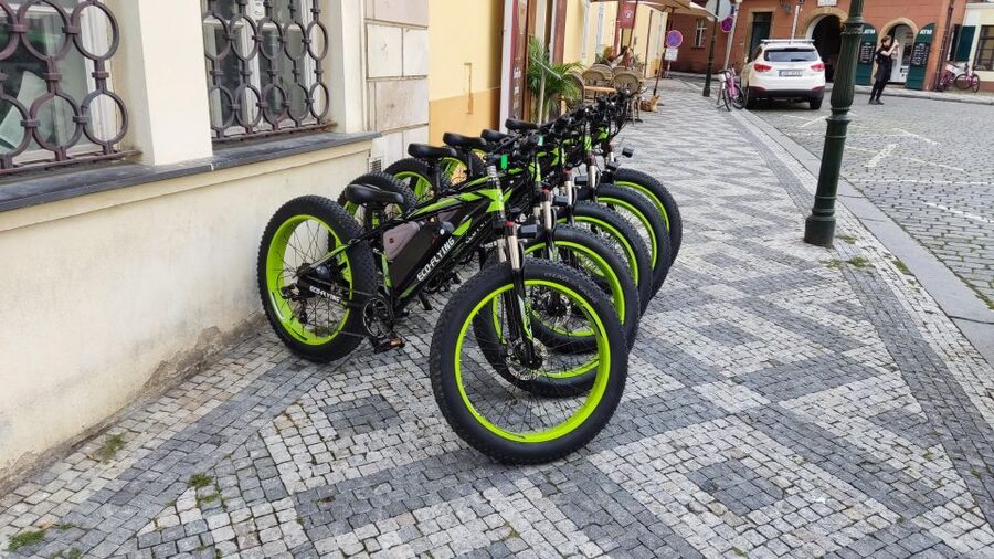 Prague: City Viewpoints Tour by Electric Fat Bike - The early landmarks: Lennon Wall, Gremlin water mill, and Kafka-area stops