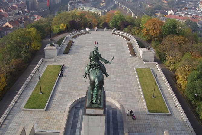Prague Cold War Walking Tour - Short view break at the Žižkov TV tower: brutalist angles and propaganda geography