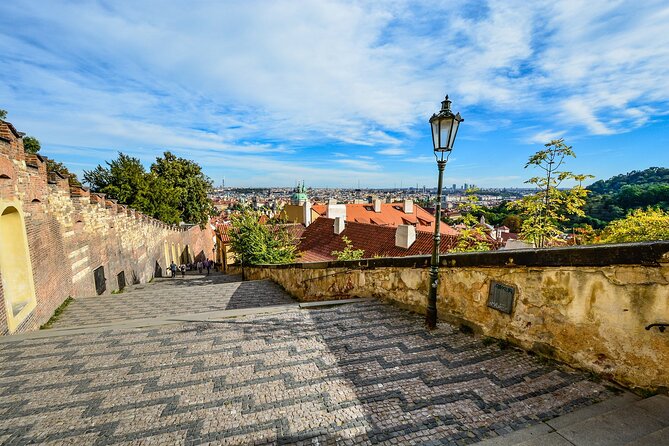 Prague DeLuxe Tour: Views, Hidden Gems, Tastings & River Cruise - Malá Strana and the Infant Jesus of Prague