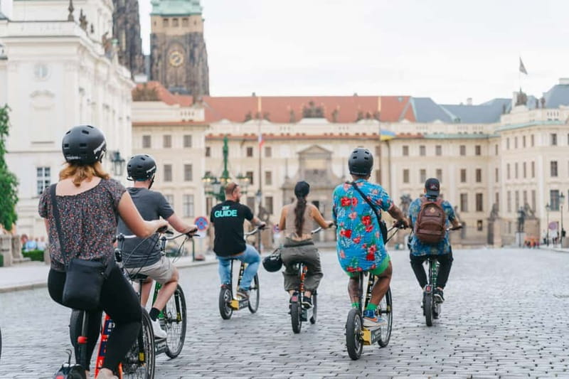 Prague: E-Scooter Grand City & Panoramas Small-Group Tour - Charles Bridge starts the whole ride at street level