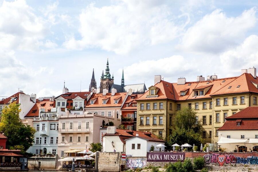 Prague: Full-Day Sightseeing Tour with Cruise and Lunch - Charles Bridge views and the Castle approach from the Vltava’s right bank