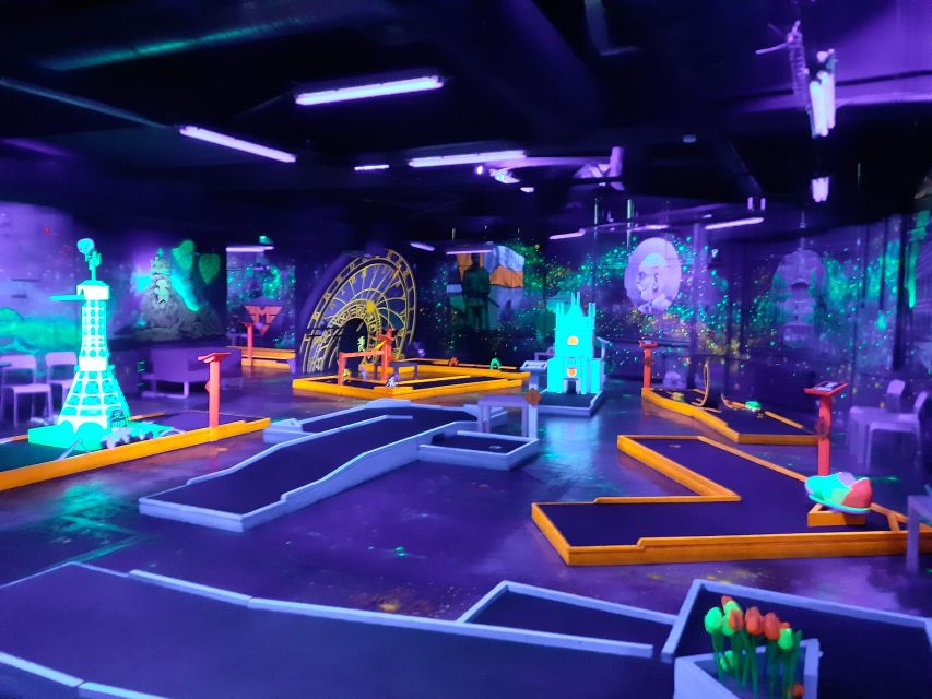 Prague: Glow Golf Mini Golf Game by UV Light - The 18 UV-lit mini golf course: murals, glow effects, and game variety