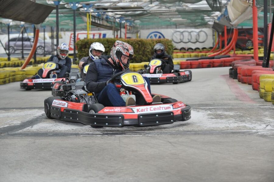 Prague: Go-Kart Racing Experience - Food and recovery: cheeseburger, beer, and the mask souvenir