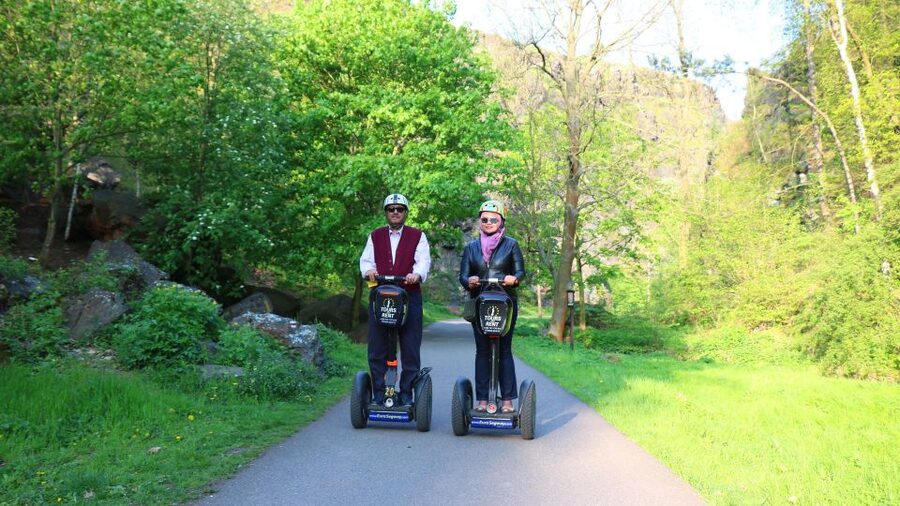 Prague: Grand Segway and eScooter Live Guided City Tour - Passing institutions and shifting from landmark mode to “city texture”