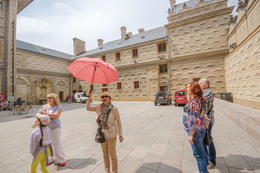Prague: Guided Bus & Walking Tour with River Cruise & Lunch - Charles Bridge and the Walk Toward Old Town Square