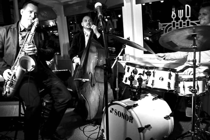 Prague: Jazz Boat Popular Live Jazz Dinner Cruise - Getting on board: cozy seating, covered decks, and small-boat comfort