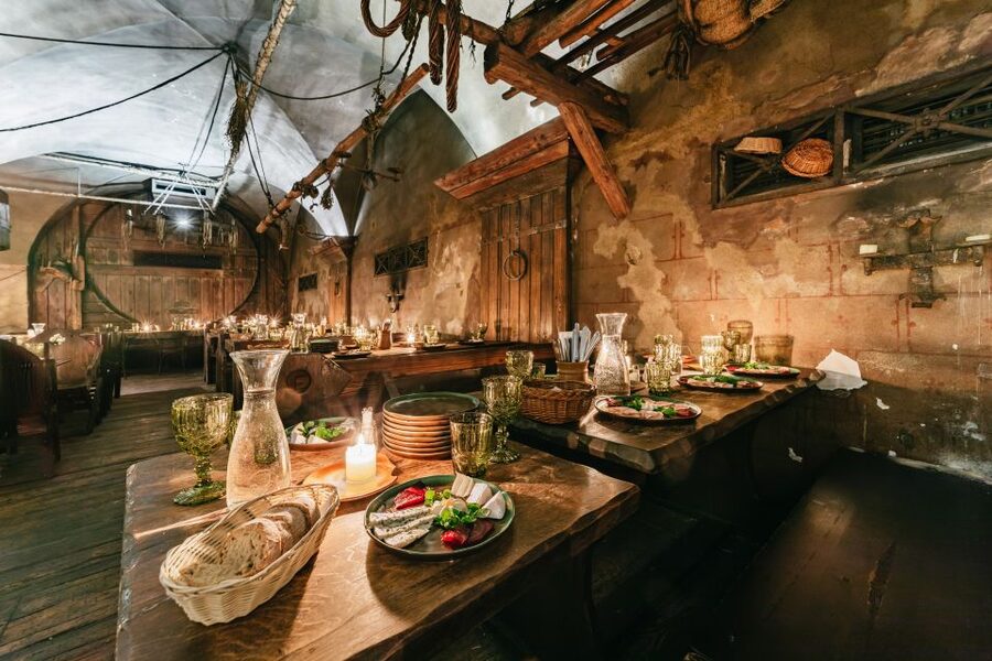 Prague: Medieval Dinner with Unlimited Drinks - The medieval show: swordplay, jugglers, and belly dancers