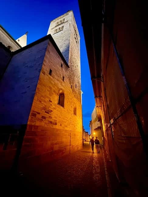 Prague: Night Walk through Prague Castle with City Views - Time jumps: St. Vitus Cathedral, Charles IV, and the 14th century feeling
