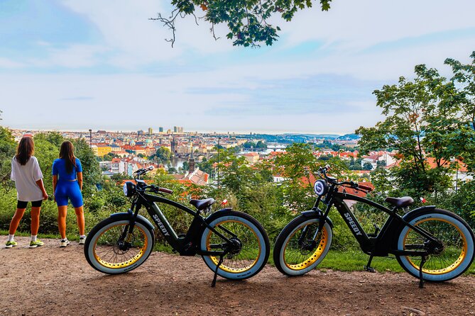 Prague on Stylish Retro styled E-Bike - Viewpoints & Sightseeing - Strahov Monastery Brewery, Lennonova zeď, and the river approach