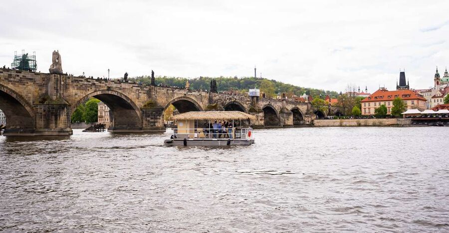 Prague: Party Tiki Boat Sightseeing Cruise with Drinks - Drinks onboard: unlimited Budvar beer, plus how the group choice works