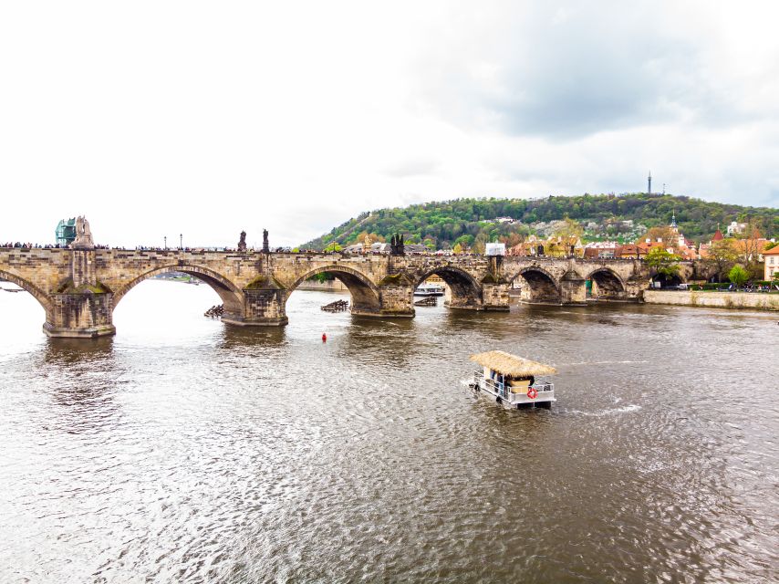 Prague: Party Tiki Boat Sightseeing Cruise with Drinks - Logistics that matter: meeting point, no pickup, and what to bring