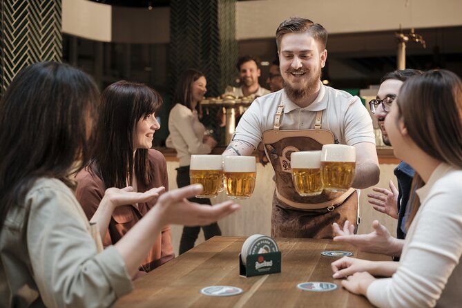 Prague Pilsner Urquell Experience with 3 Free Beer Tastings - The upstairs Beer Hall: tapster shows, seating, and souvenir buying