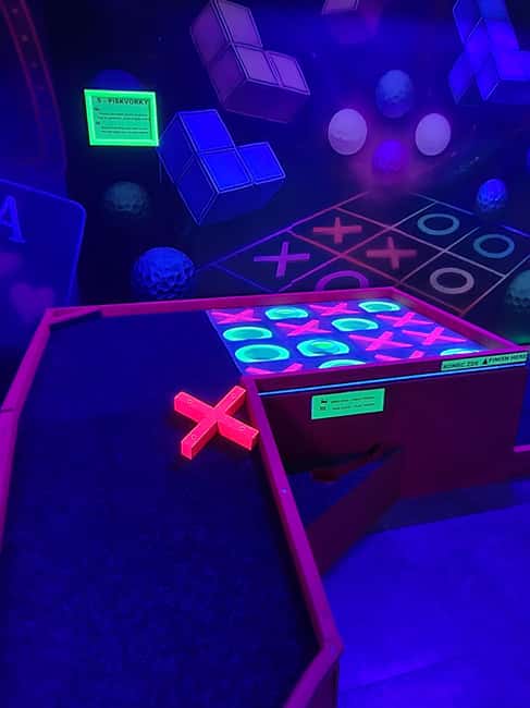 Prague: Punk Minigolf Glow-in-the-Dark Entry Ticket - Walking Into the Saxon Courtyard Glow Zone