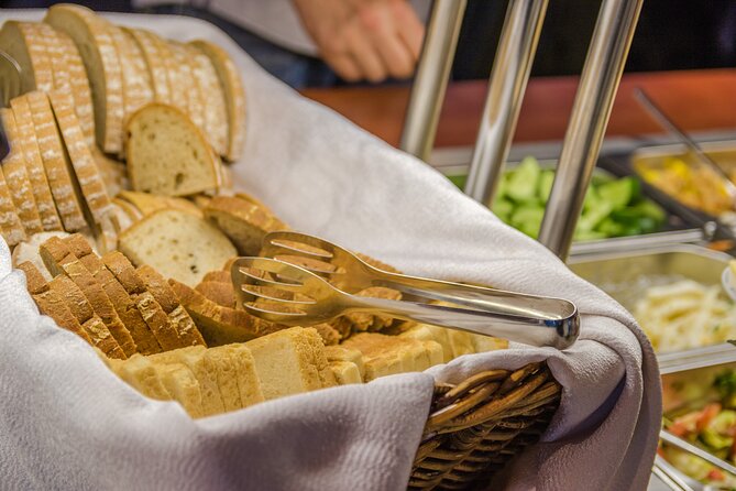 Prague: Sightseeing Boat Cruise with Buffet Dinner - Welcome drink and extra drinks: what you should expect