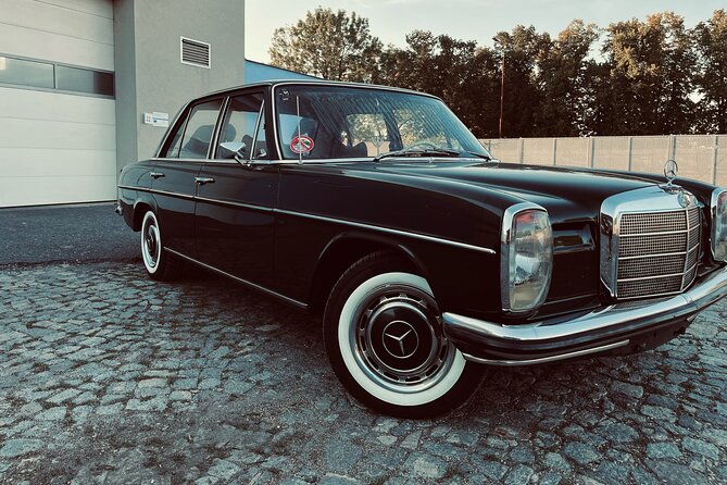 Prague Sightseeing Express Tour in Classic Car - Charles Bridge: Riding Along the River With Context Built In