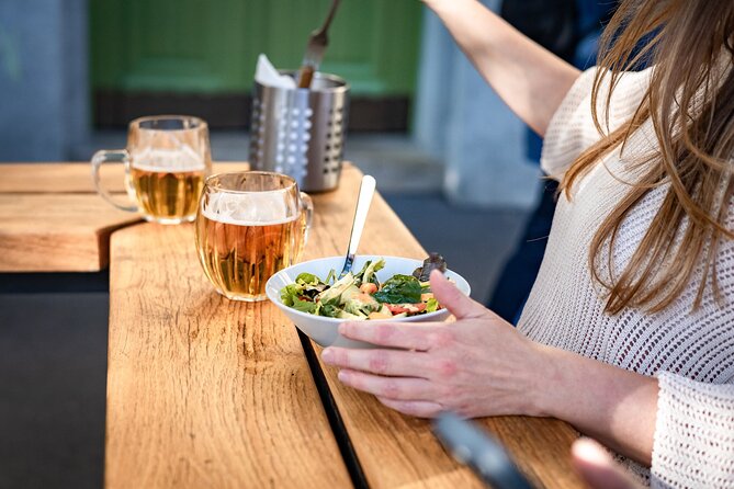 Prague Snack & Stroll: Private Food Tour with Your Local Buddy - Karlín Square and Kasarna Karlin: hipster history with practical hangout space