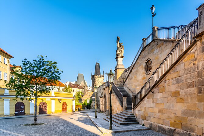Prague to Full in Small Groups - Old Town icons: Astronomical Clock, Powder Tower, Old Town Square, and Charles Bridge