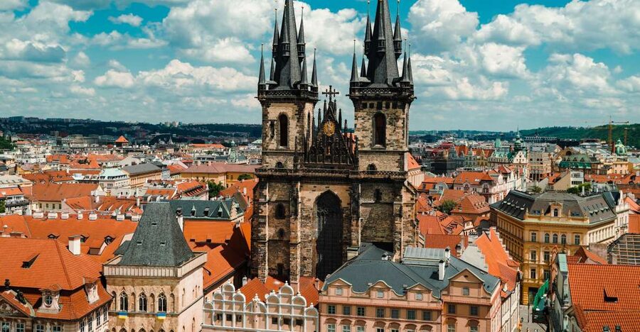 Prague: Top Sights and Historic Center Introduction Tour - Charles University corner: a little Czech, and a big opera moment