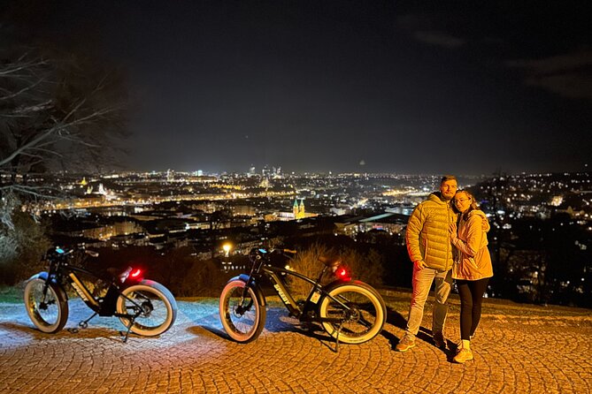Retro Style E-Bike Night Tour in Prague - Live Guided - Pariska Street luxury drive-by and the Old Town Square clock moment