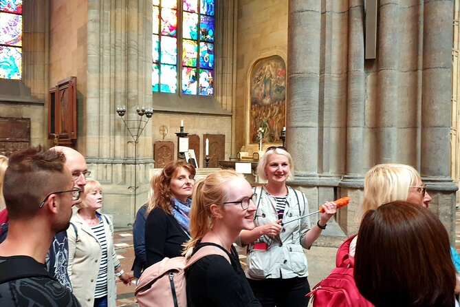 Skip the line: Prague Castle Interiors Tour with Local Guide - Stop 3: St. George’s Basilica for quieter stone and the double staircase